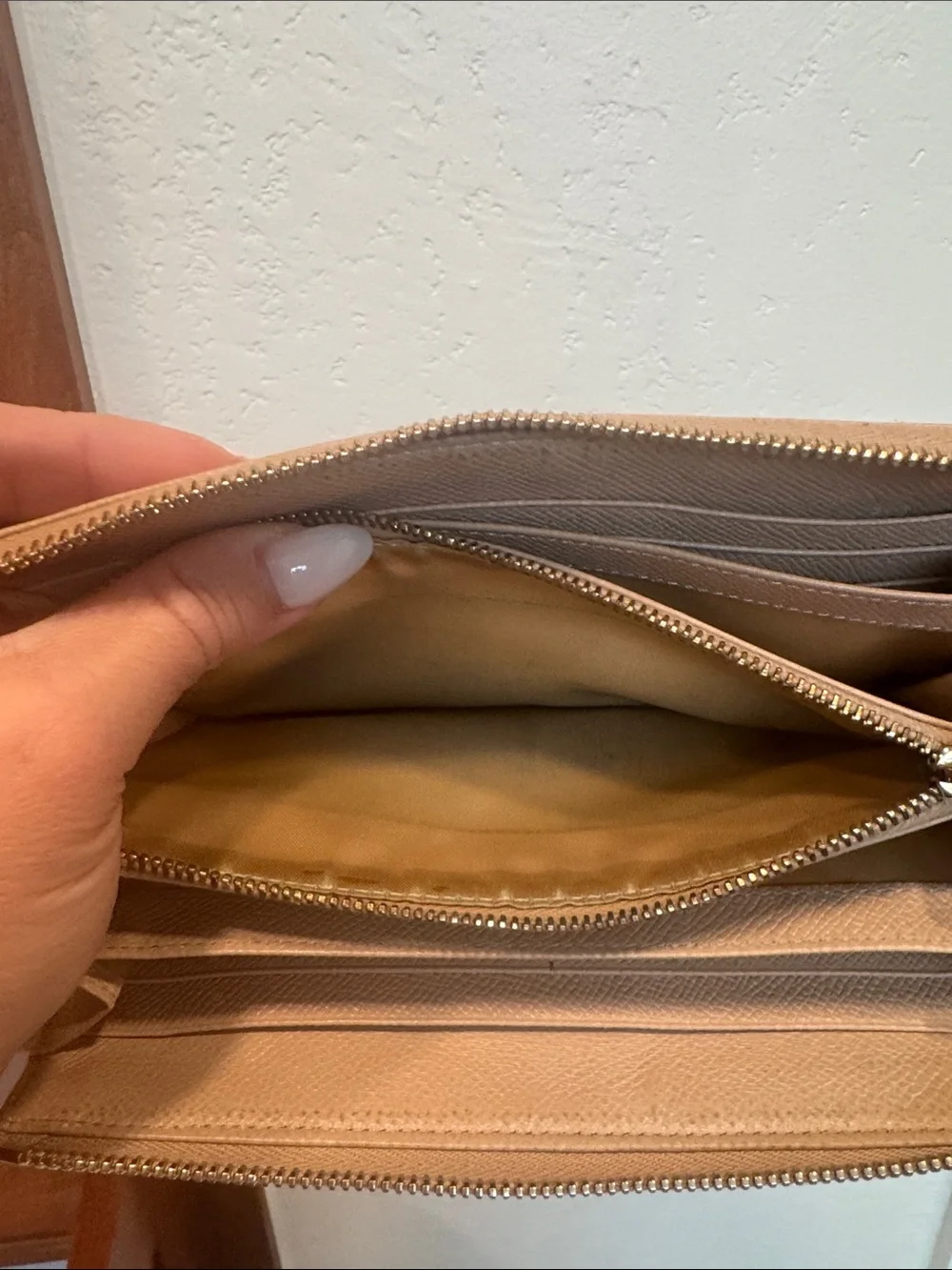 TOD'S Blush Beige Zip Wallet with Tassel Pull